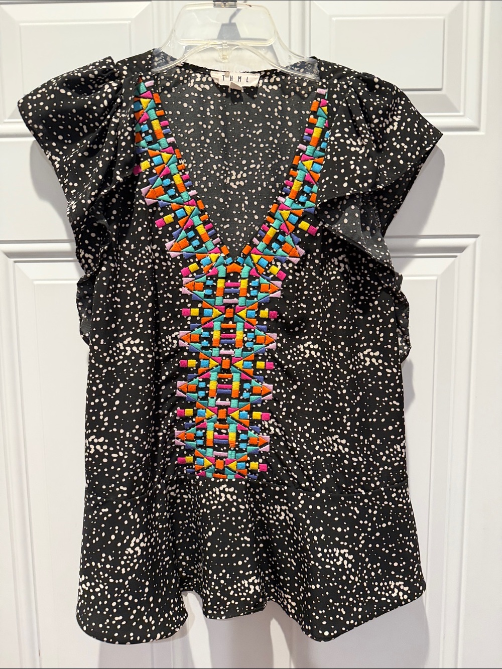 THML Black Speckled Flutter Sleeve Top with Vibrant Geometric Embroidery